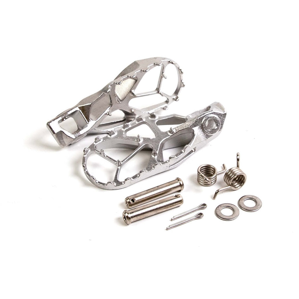 Footpegs (complete) – KTM SX(F)/XC(F) 2023→, EXC(F)/XC(F)‑W 2024→, Husqvarna TC/FC/FX/TX 2023→, FE/TE 2024→, GasGas EC(F)/MC(F)/EX(F) 2024→, silver