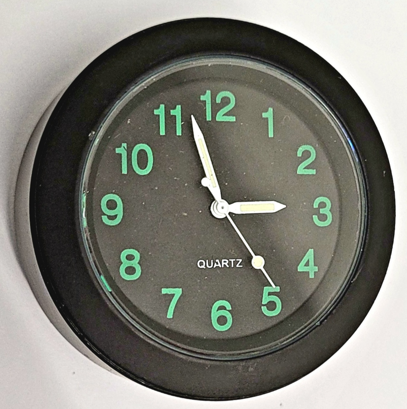 Handlebar clock black, black dial, green numerals